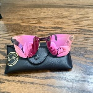 Ray-Ban Women’s Pink Mirrored Rimless Sunglasses.
